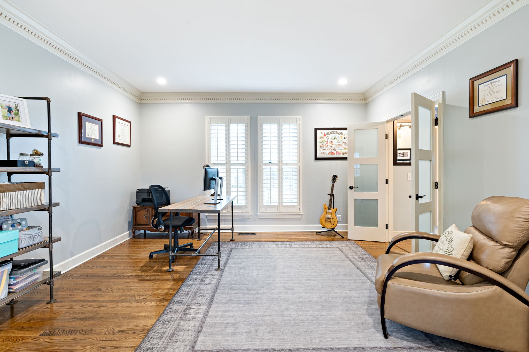 910 Riverbend Road Nashville, TN 37221 - Photo 17 of 48 a living room with furniture gym equipment and a window