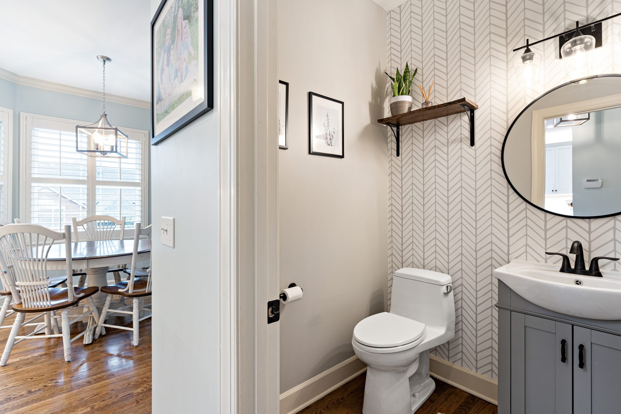 910 Riverbend Road Nashville, TN 37221 - Photo 19 of 48 a bathroom with a toilet sink and mirror