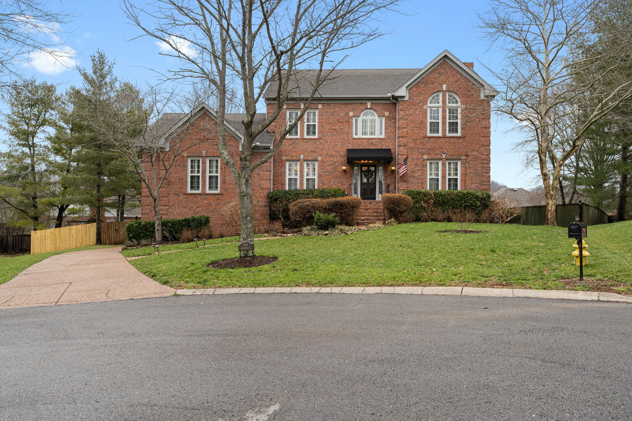 910 Riverbend Road Nashville, TN 37221 - Photo 2 of 48 a front view of house with yard and green space