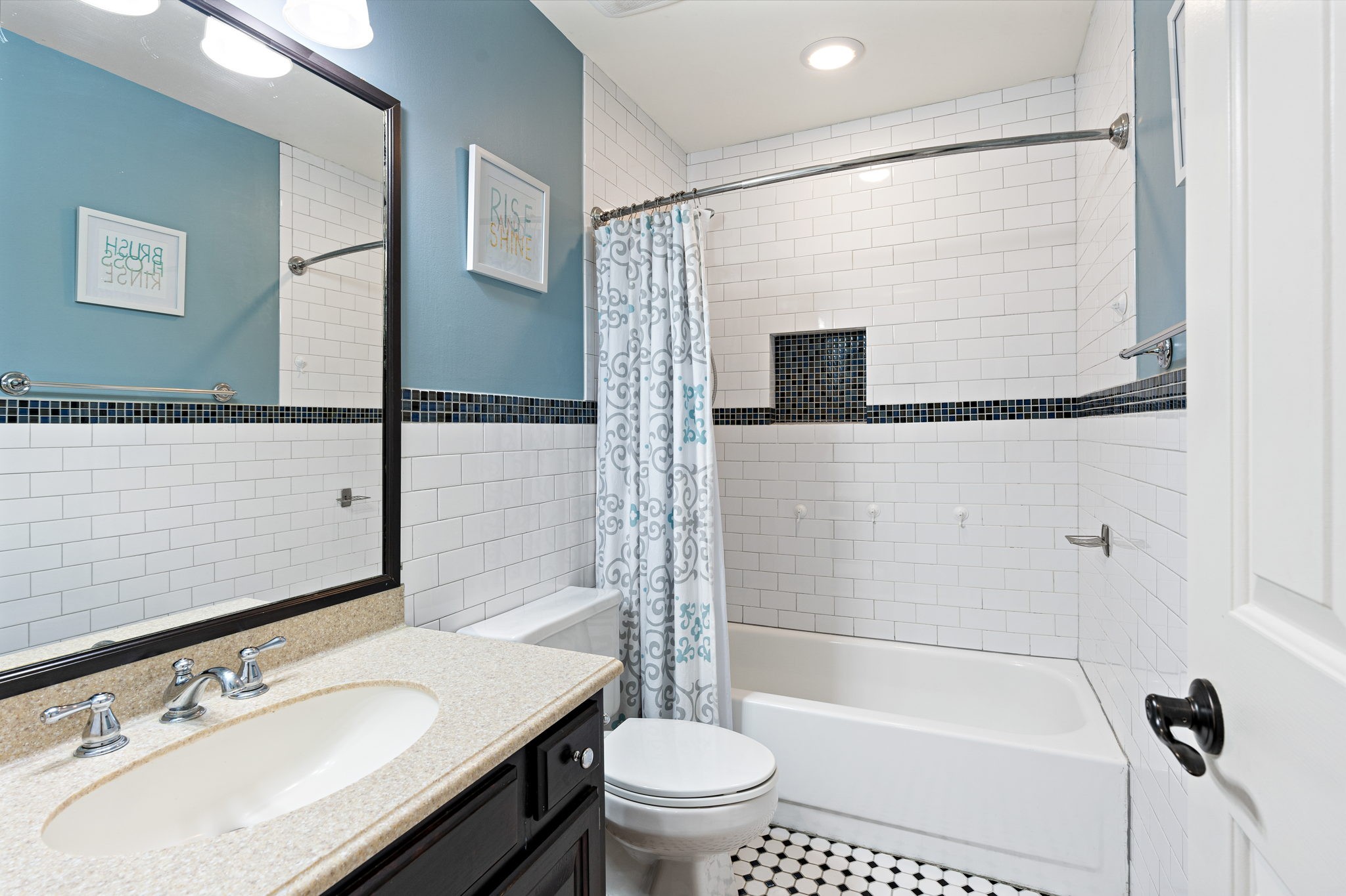 910 Riverbend Road Nashville, TN 37221 - Photo 33 of 48 a bathroom with a sink a toilet and a mirror