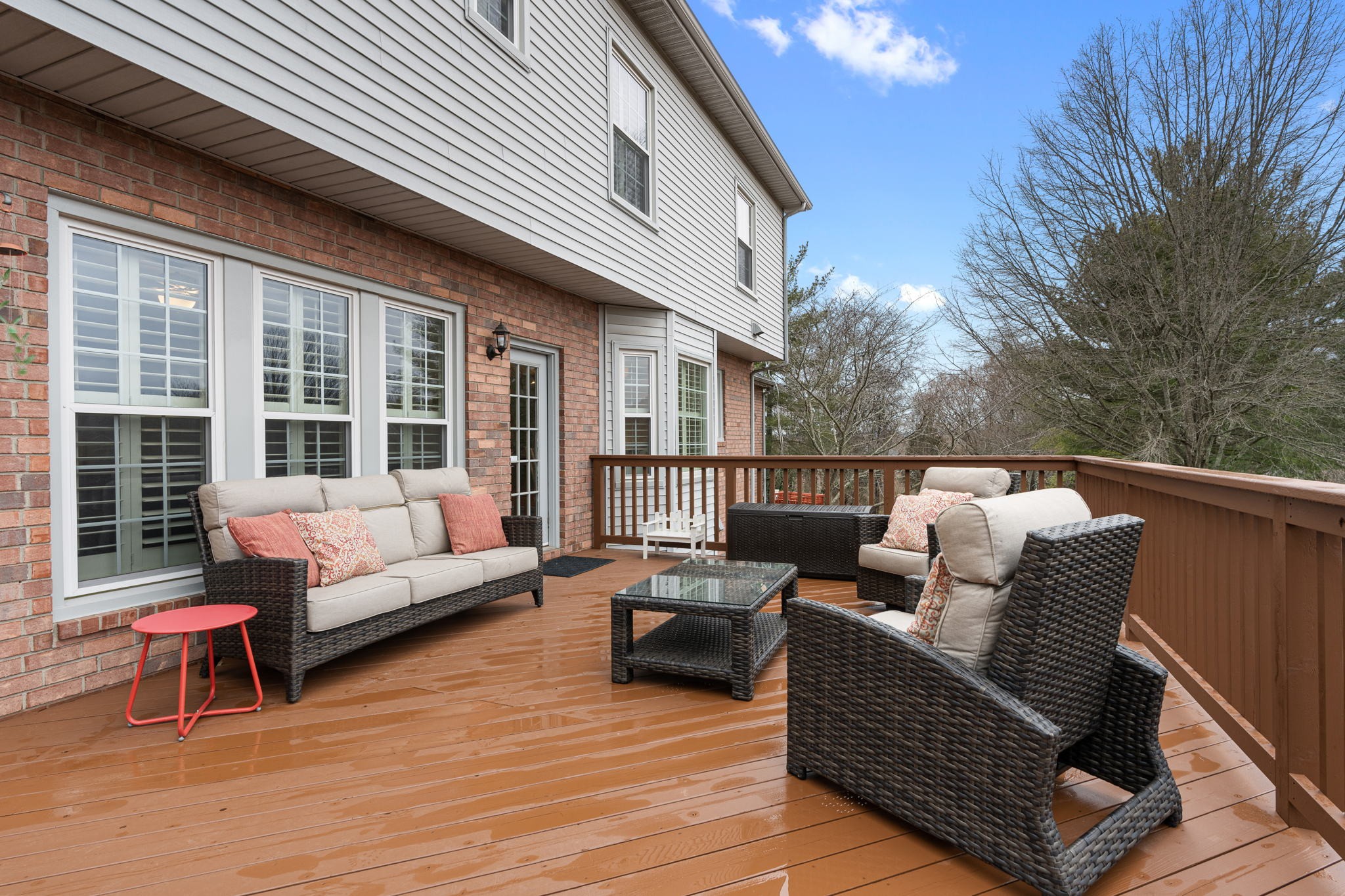 910 Riverbend Road Nashville, TN 37221 - Photo 38 of 48 a balcony with furniture and wooden floor