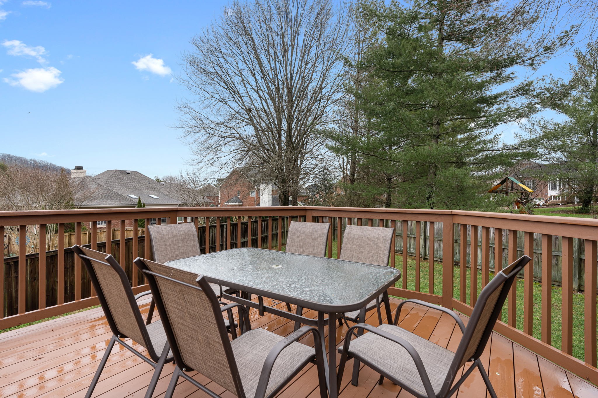 910 Riverbend Road Nashville, TN 37221 - Photo 39 of 48 a view of a chair and table on the deck