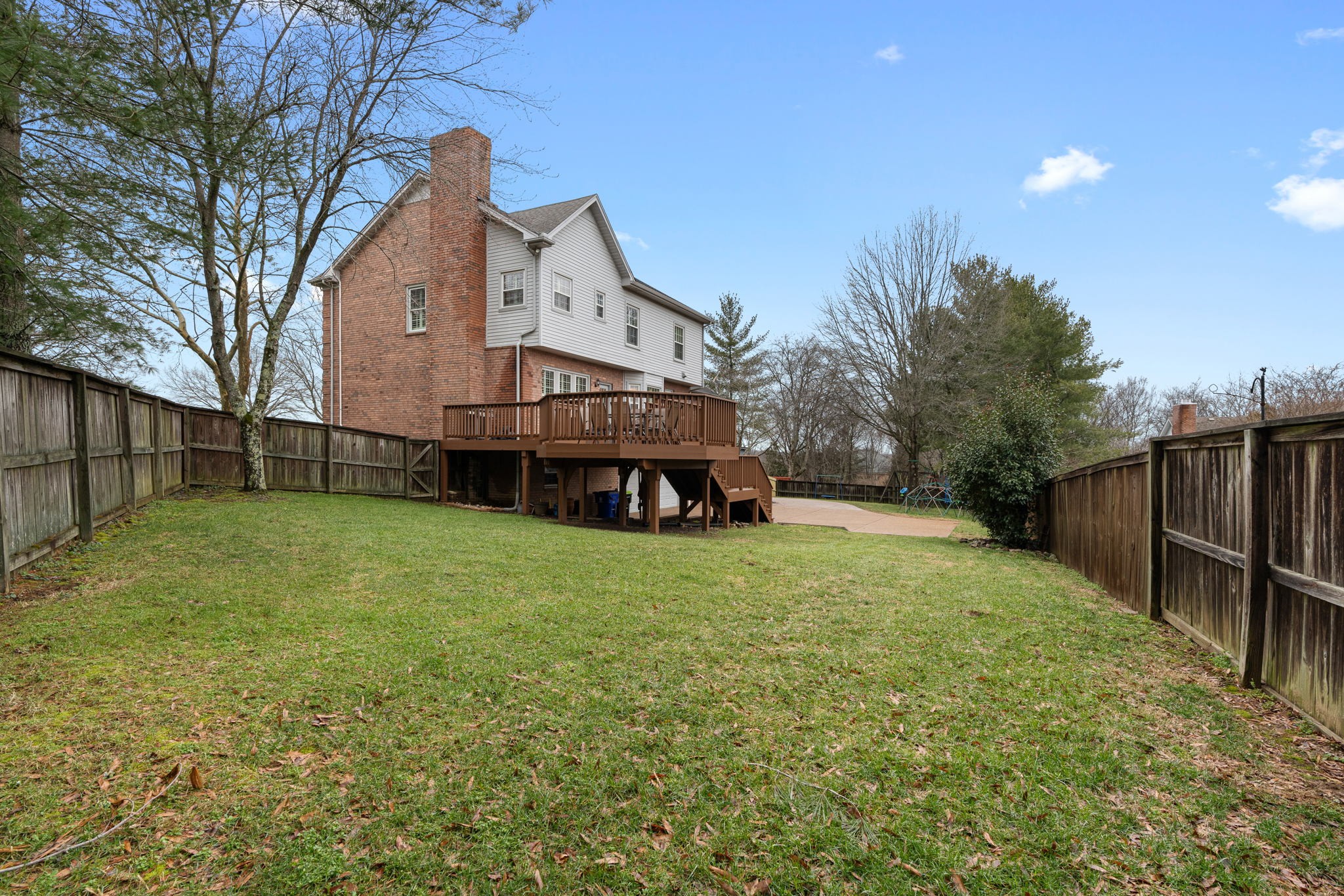 910 Riverbend Road Nashville, TN 37221 - Photo 40 of 48 a front view of a house with garden