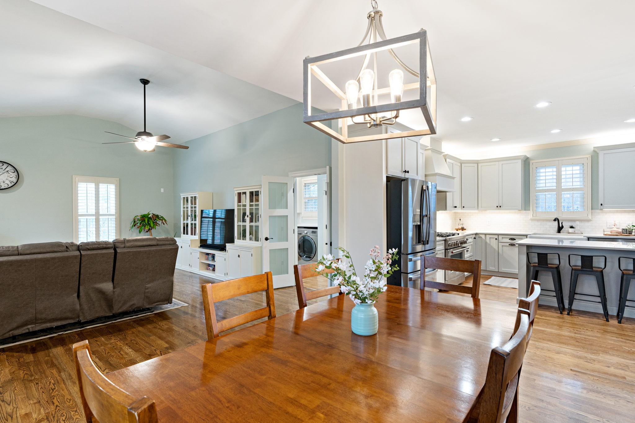 910 Riverbend Road Nashville, TN 37221 - Photo 8 of 48 a living room with lots of furniture and kitchen view