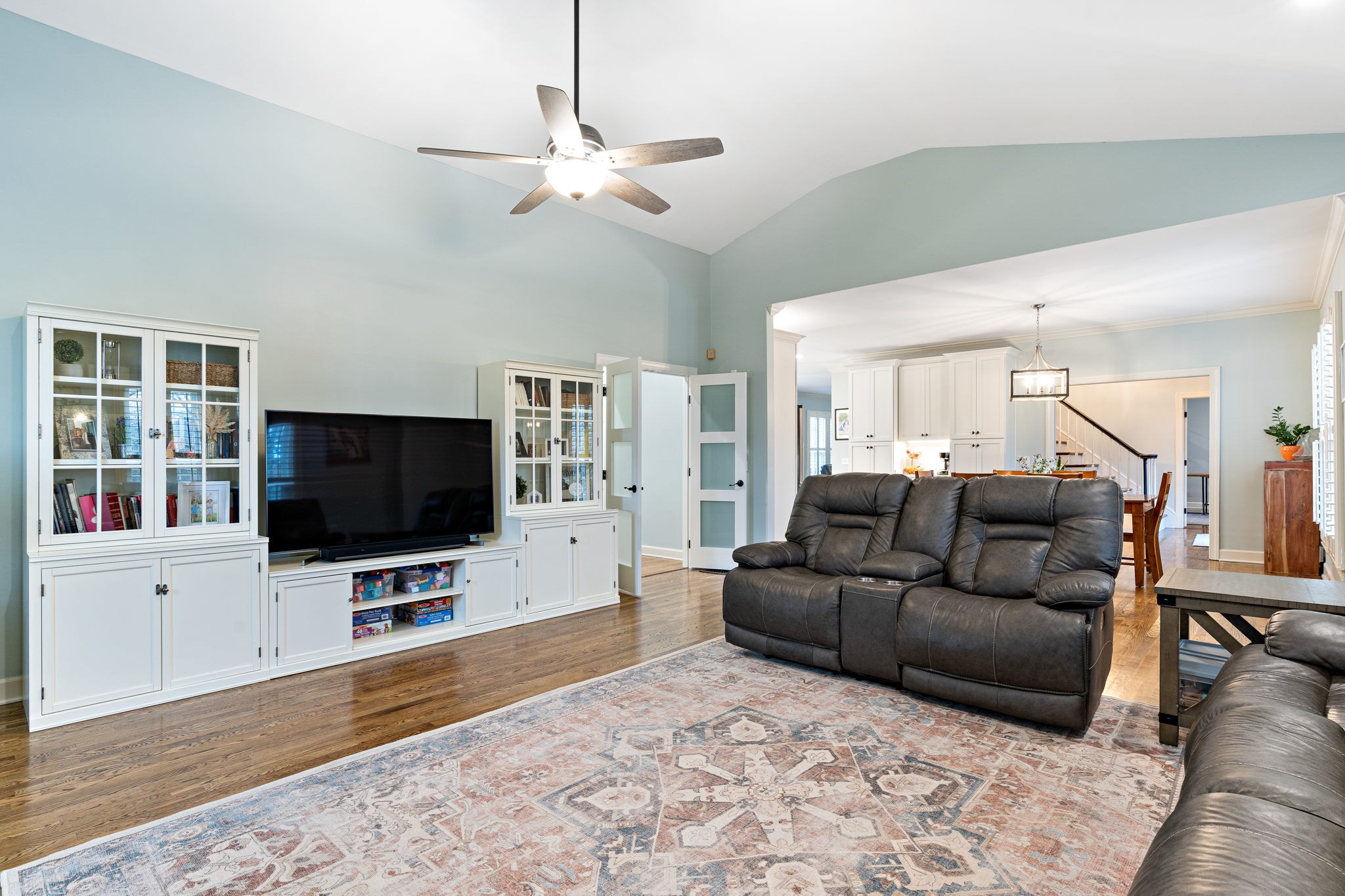 910 Riverbend Road Nashville, TN 37221 - Photo 10 of 48 a living room with furniture and a flat screen tv