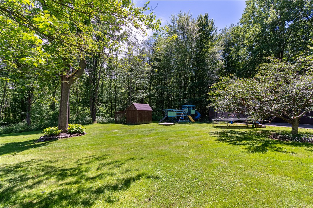 7733 East Port Bay Road Wolcott, NY 14590 - Photo 46 of 49 The storage shed and playground! Lots of room on this over 3 acre parcel!!