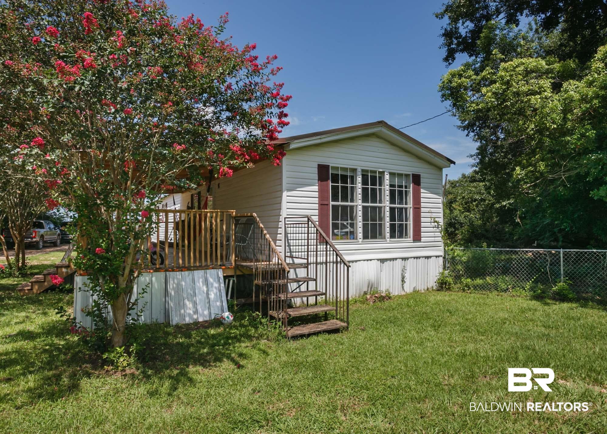 14005 County Road 49 Foley, AL 36535 - Photo 5 of 38 Back of house featuring a wooden deck