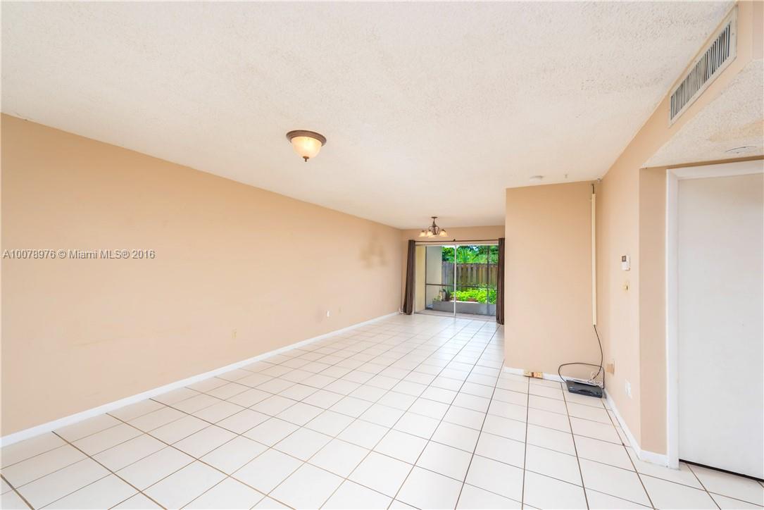 8375 Southwest 137th Avenue, Unit 8375 Miami, FL 33183 - Photo 16 of 30 a view of an empty room and window