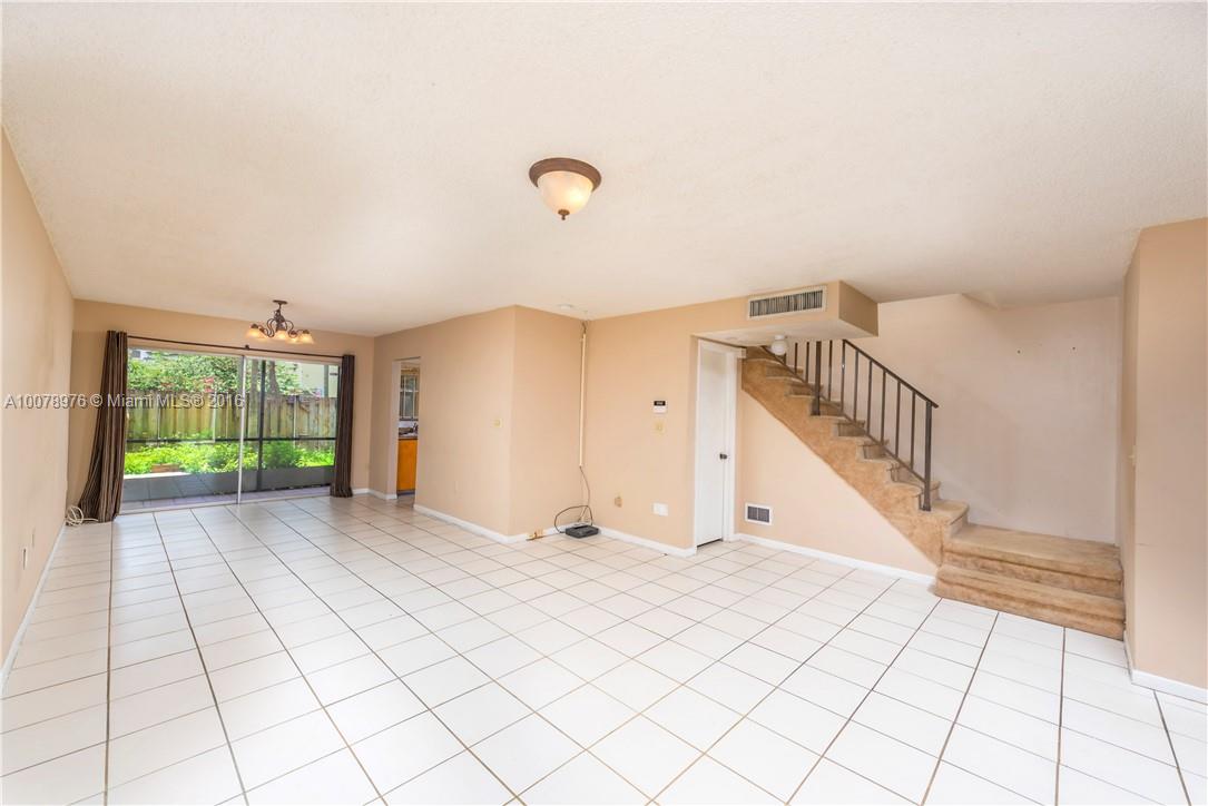 8375 Southwest 137th Avenue, Unit 8375 Miami, FL 33183 - Photo 17 of 30 a view of an entryway with wooden floor