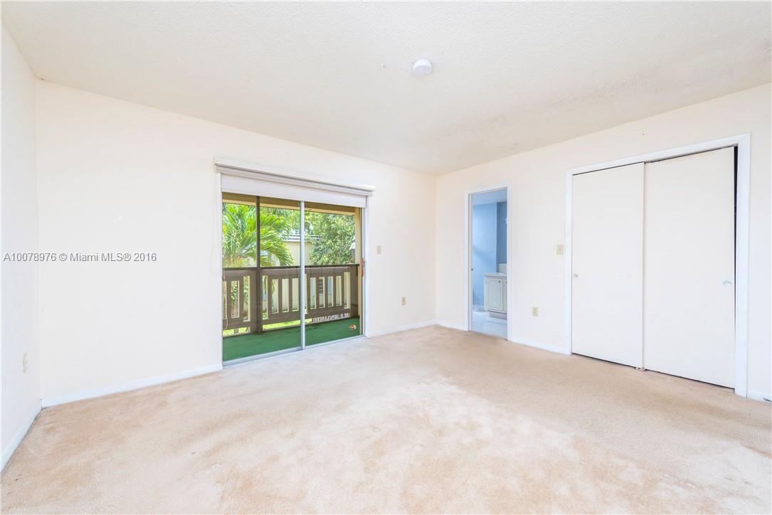 8375 Southwest 137th Avenue, Unit 8375 Miami, FL 33183 - Photo 22 of 30 a view of a room with a large window