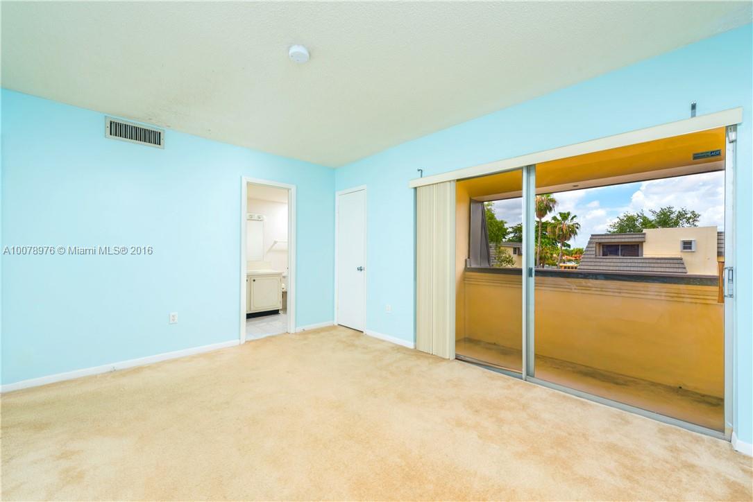 8375 Southwest 137th Avenue, Unit 8375 Miami, FL 33183 - Photo 26 of 30 a view of an empty room with a window