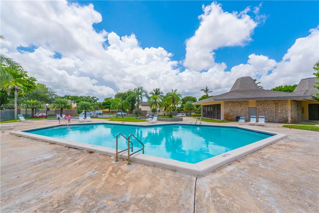 8375 Southwest 137th Avenue, Unit 8375 Miami, FL 33183 - Photo 30 of 30 a view of a swimming pool with outdoor seating