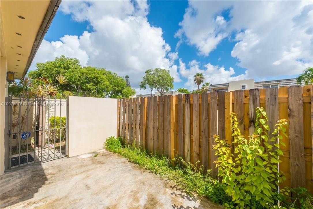 8375 Southwest 137th Avenue, Unit 8375 Miami, FL 33183 - Photo 7 of 30 a view of outdoor space with garden