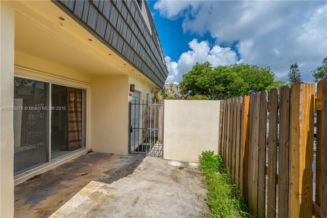 8375 Southwest 137th Avenue, Unit 8375 Miami, FL 33183 - Photo 8 of 30 a view of entryway with garden