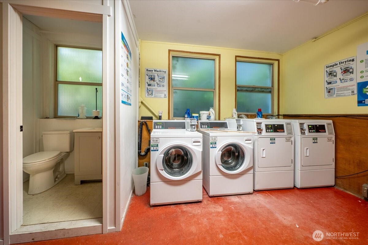 7 Harrison Street, Unit 20 Seattle, WA 98109 - Photo 20 of 27 a utility room with dryer and washer