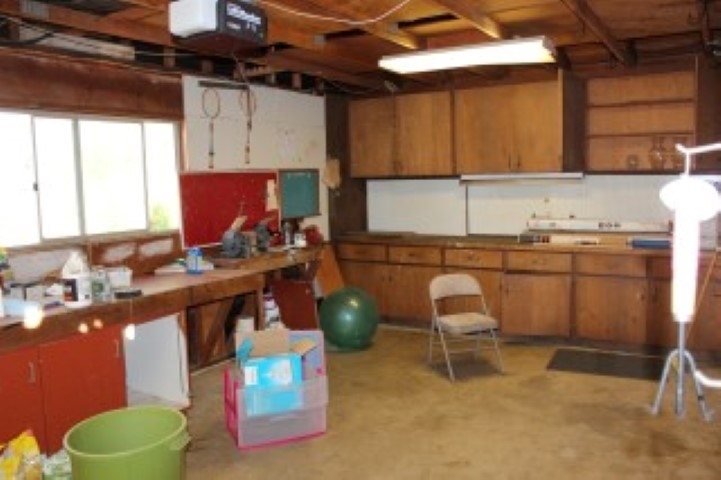 1624 Quail Ridge Road Escondido, CA 92027 - Photo 22 of 25 View of the work bench areas in the other one car garage.