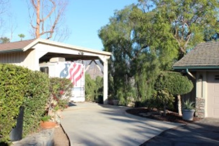 1624 Quail Ridge Road Escondido, CA 92027 - Photo 23 of 25 Large 36' x 22' covered RV parking "garage" with hookups.