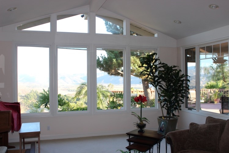 1624 Quail Ridge Road Escondido, CA 92027 - Photo 8 of 25 View out the large dual pane windows in living room which brighten the room and open it to the views and patio areas!