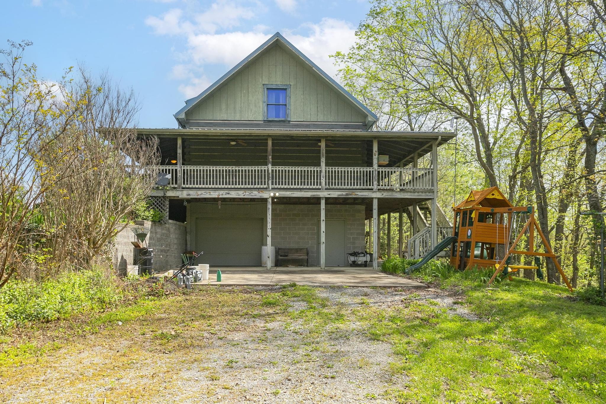 1195 Haskell Akins Road Bethpage, TN 37022 - Photo 45 of 70 a front view of a house with a yard