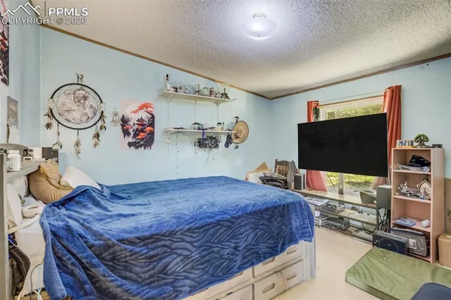 a bathroom with a sink vanity mirror and toilet