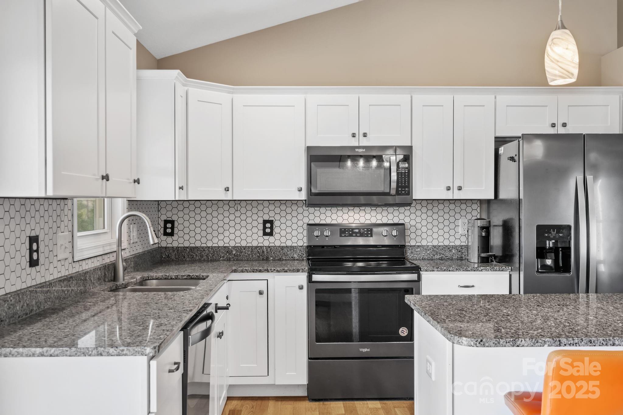 39 Curtis Miles Road Alexander, NC 28701 - Photo 12 of 37 a kitchen with granite countertop white cabinets white stainless steel appliances and a sink