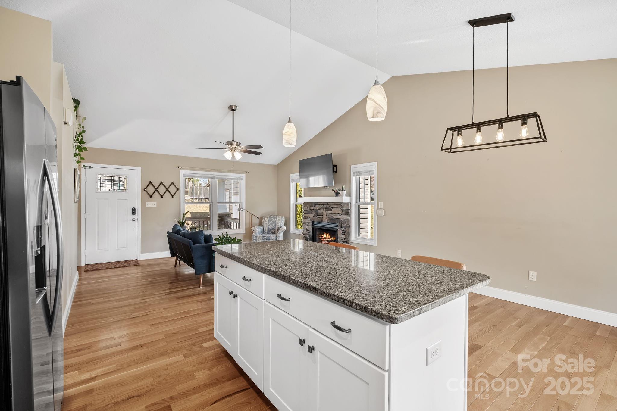 39 Curtis Miles Road Alexander, NC 28701 - Photo 14 of 37 a kitchen with stainless steel appliances granite countertop a refrigerator a sink and a stove