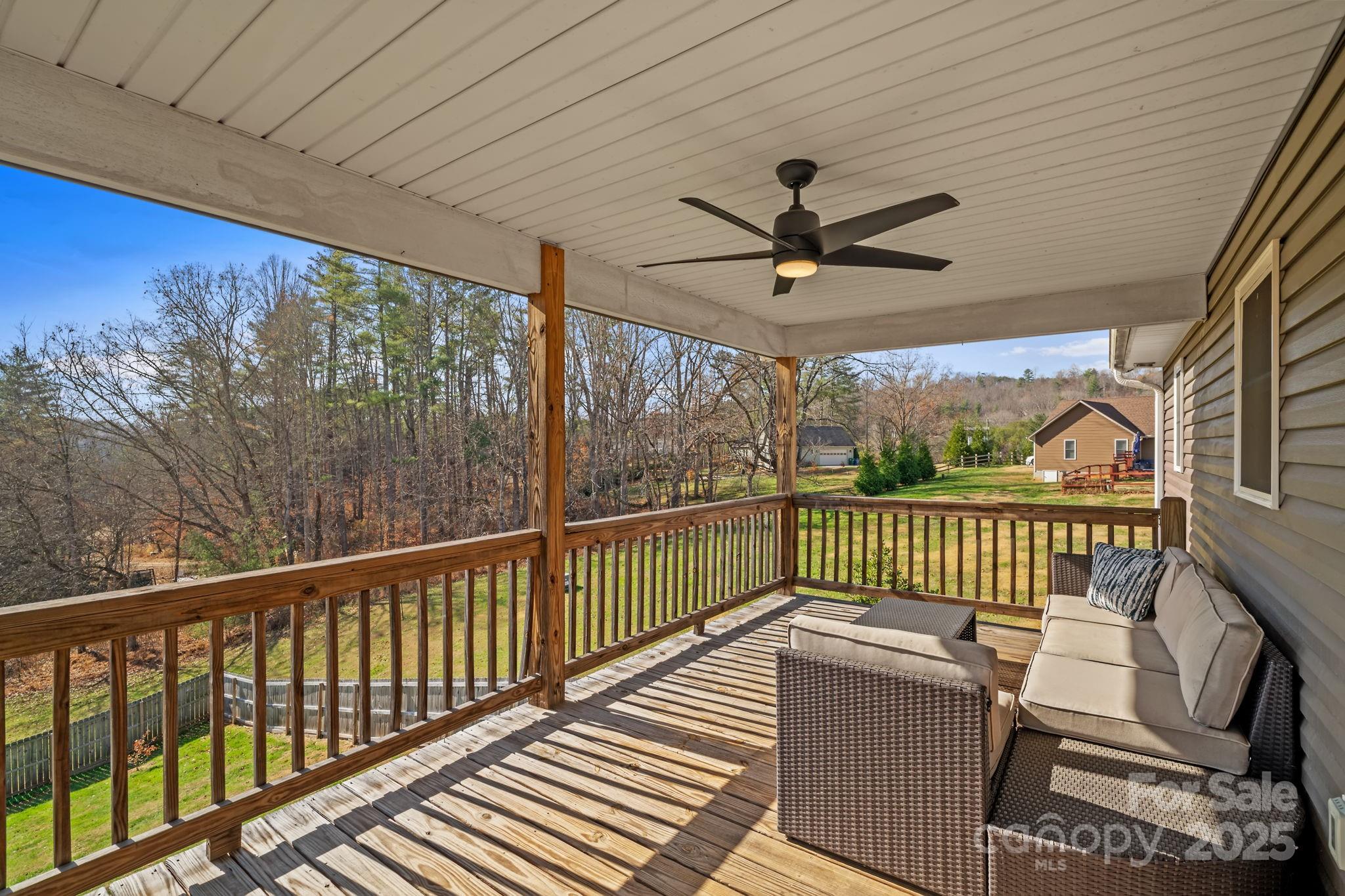 39 Curtis Miles Road Alexander, NC 28701 - Photo 17 of 37 a view of a chairs in balcony