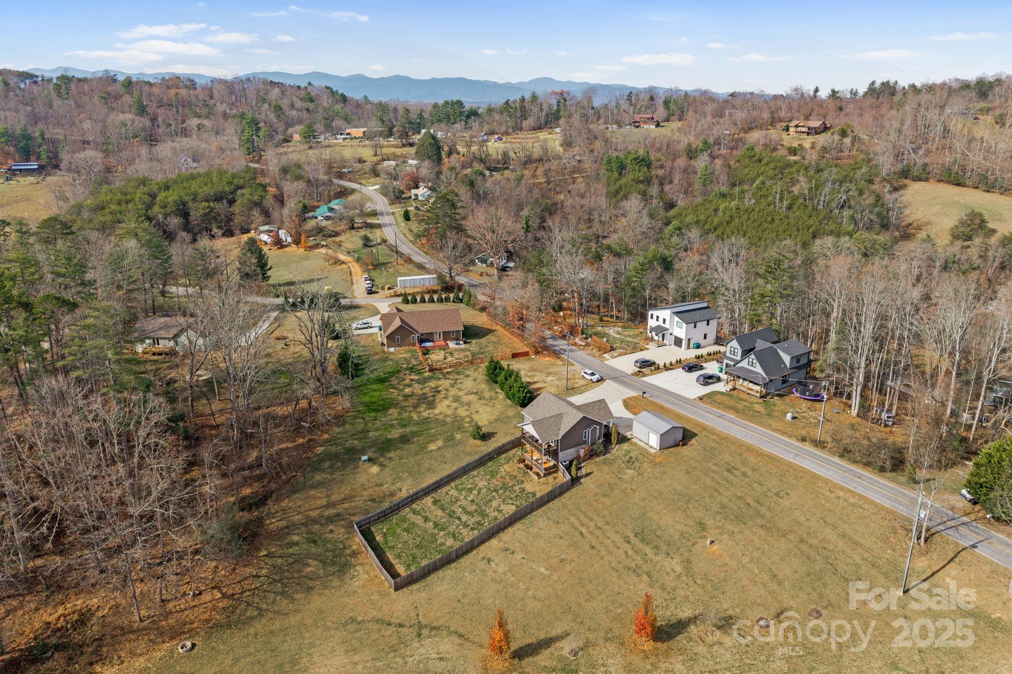 39 Curtis Miles Road Alexander, NC 28701 - Photo 35 of 37 an aerial view of residential house with outdoor space
