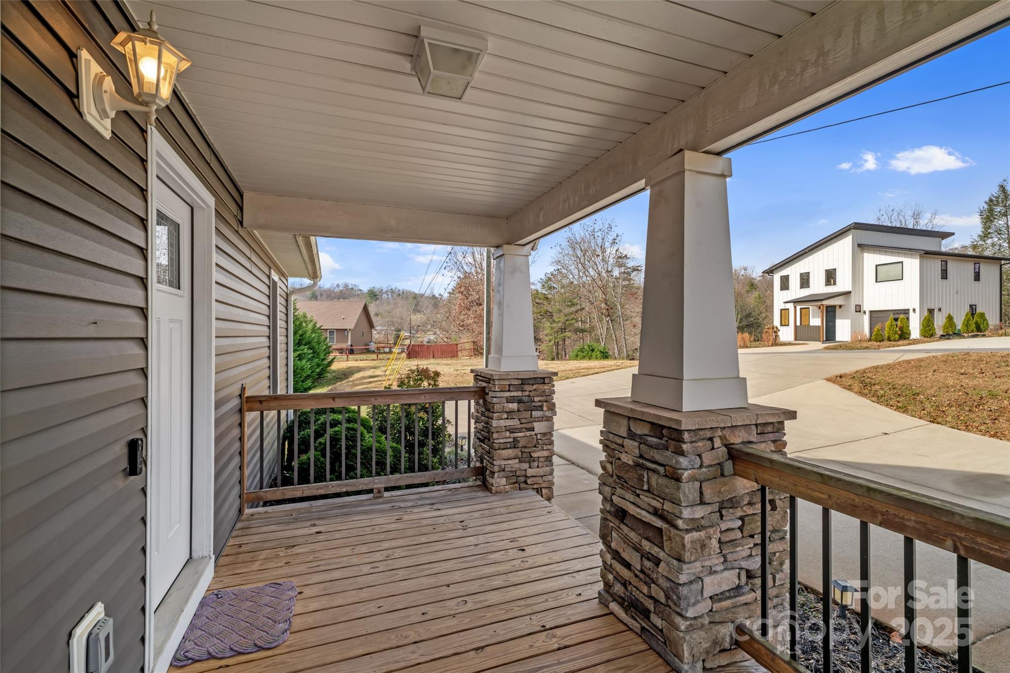 39 Curtis Miles Road Alexander, NC 28701 - Photo 4 of 37 a porch with seating space