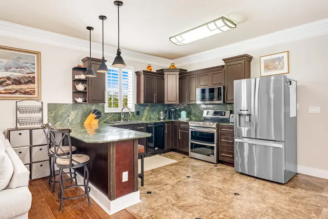 $999,999 | 306 Coconut Grove Court, Panama City Beach, FL 32407