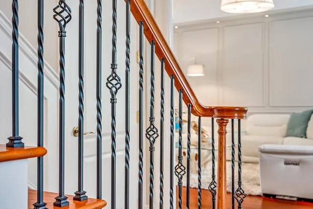 a bathroom with a sink a mirror a toilet and shower