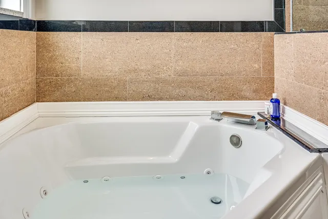 an aerial view of residential building with parking space