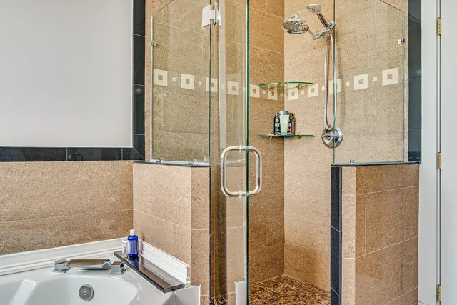 a view of a swimming pool with an outdoor seating