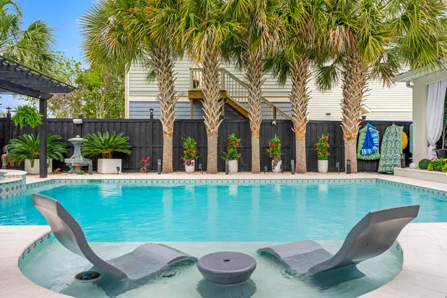 a view of a swimming pool with a patio