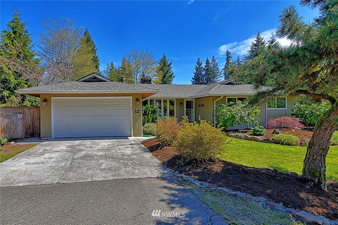 11619 31st Drive Southeast Everett, WA 98208 - Photo 2 of 30 a view of a house with a garden