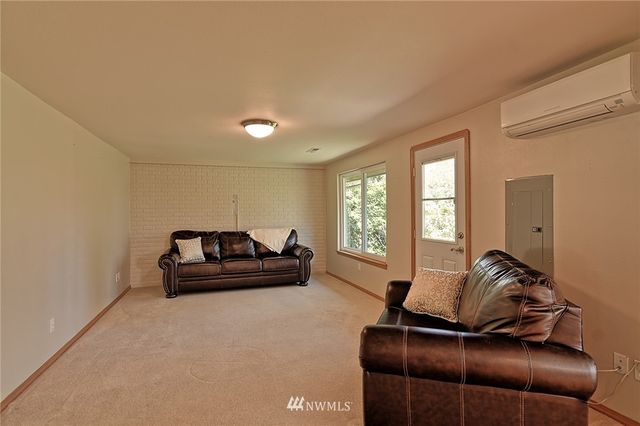 a living room with furniture and a couch
