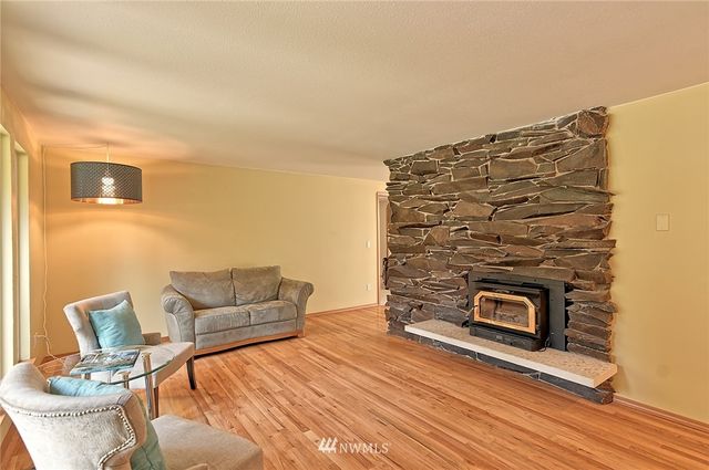 a bedroom with a bed and couch