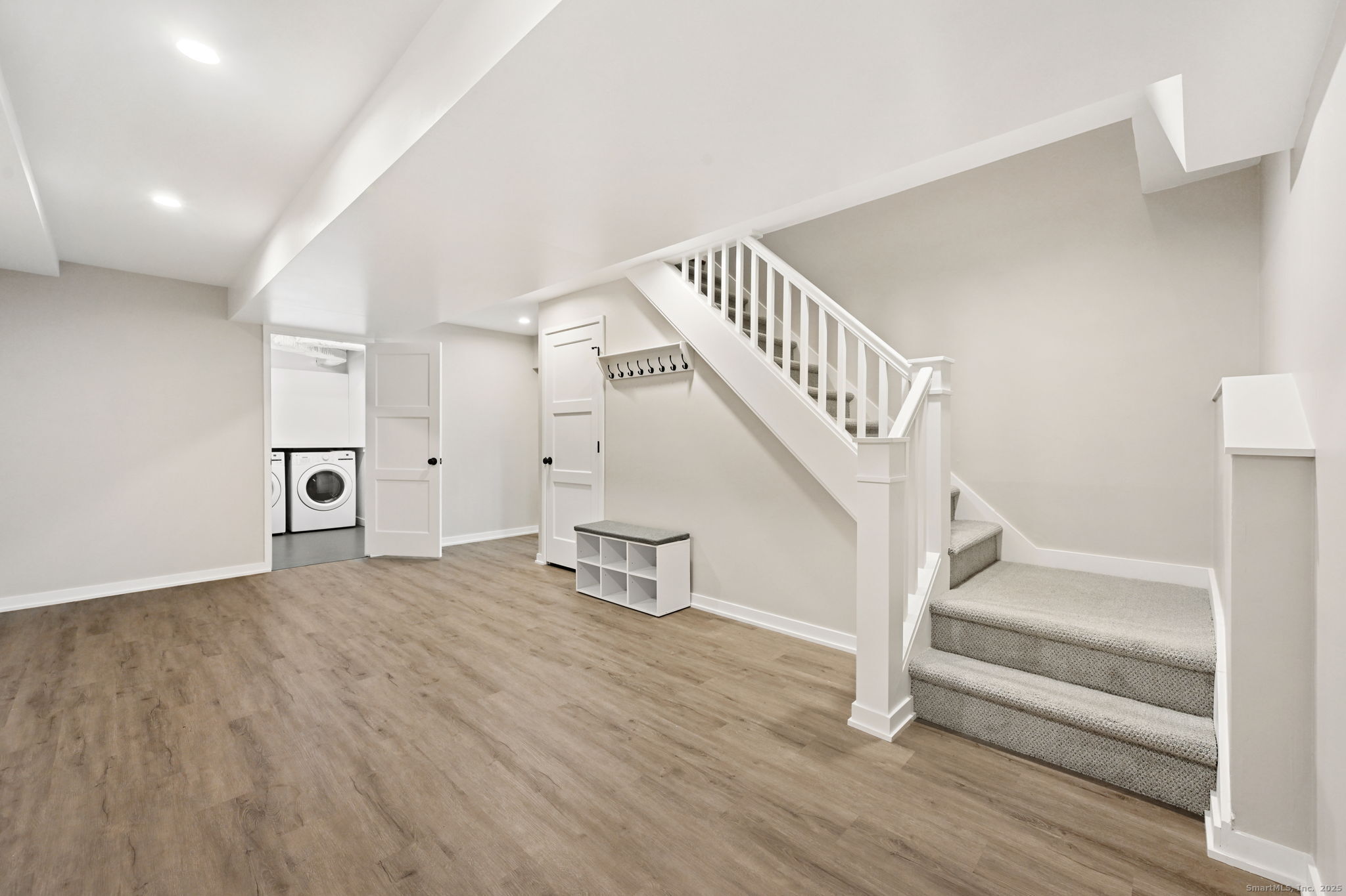 144 West Norwalk Road Norwalk, CT 06850 - Photo 17 of 29 a view of entryway and hall with wooden floor