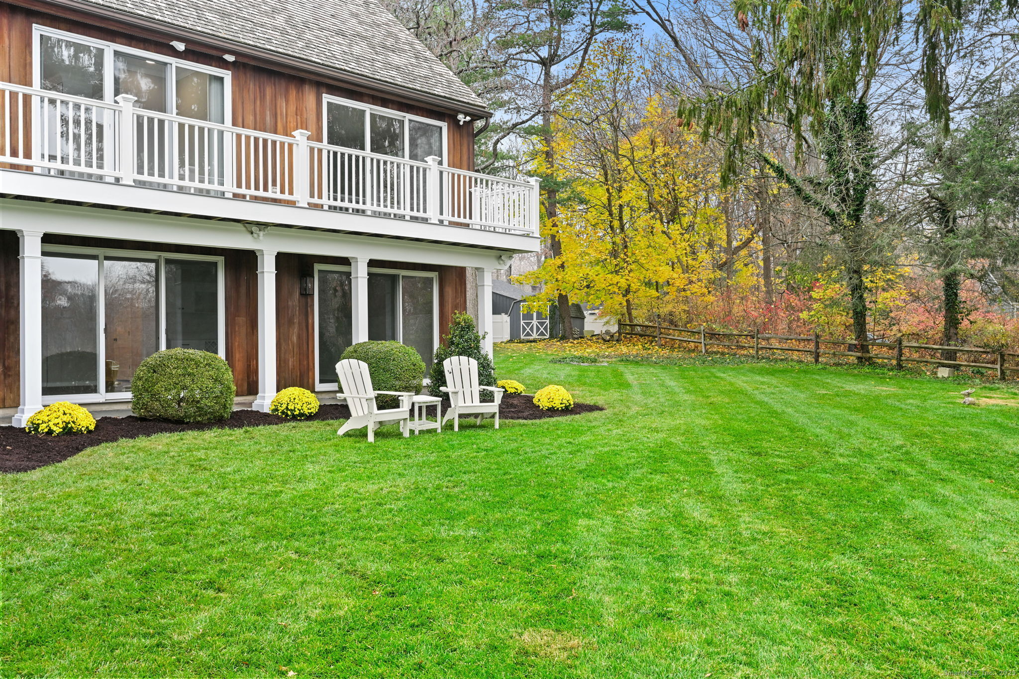 144 West Norwalk Road Norwalk, CT 06850 - Photo 20 of 29 a view of a house with a yard and sitting area