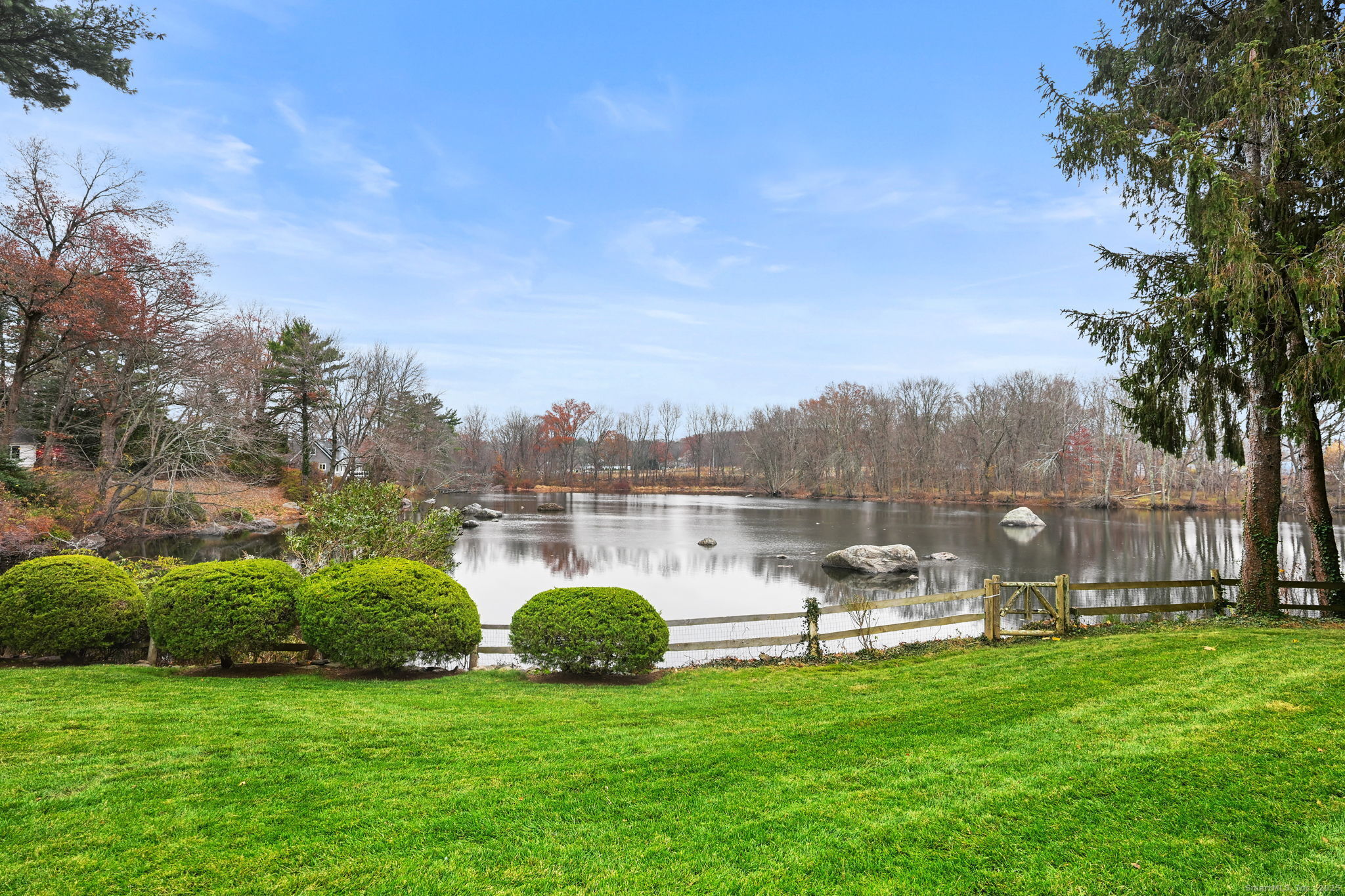 144 West Norwalk Road Norwalk, CT 06850 - Photo 2 of 29 a garden view with a lake view