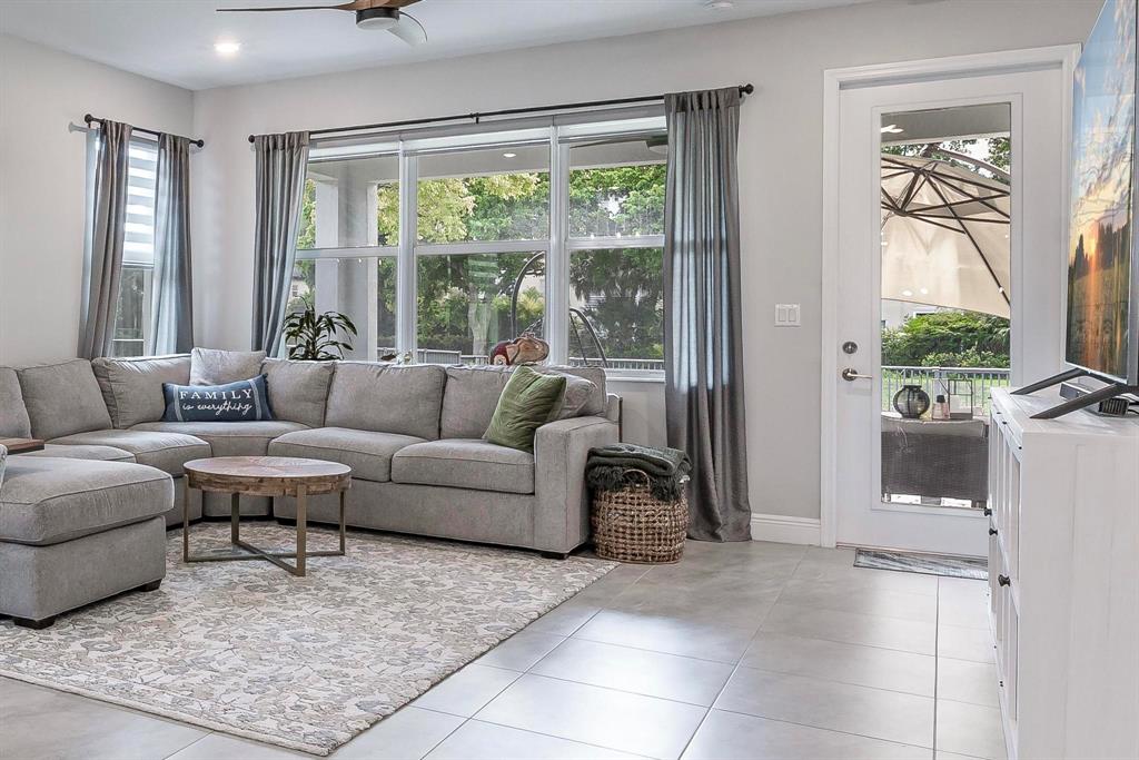 4185 Marina Way Deerfield Beach, FL 33064 - Photo 16 of 40 a living room with furniture and a large window