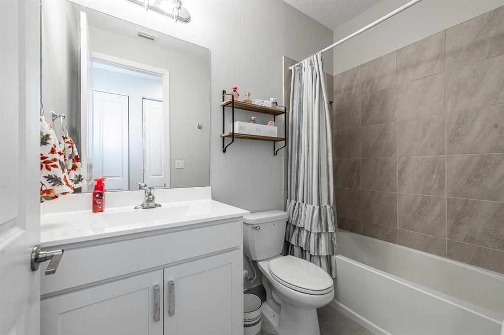 4185 Marina Way Deerfield Beach, FL 33064 - Photo 22 of 40 a bathroom with a sink a toilet and a mirror