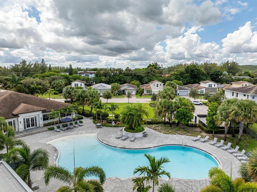 4185 Marina Way Deerfield Beach, FL 33064 - Photo 33 of 40 a view of a swimming pool and lounge chair