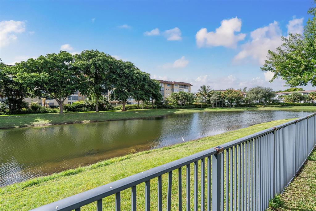 4185 Marina Way Deerfield Beach, FL 33064 - Photo 7 of 40 a view of a lake with a city from a balcony