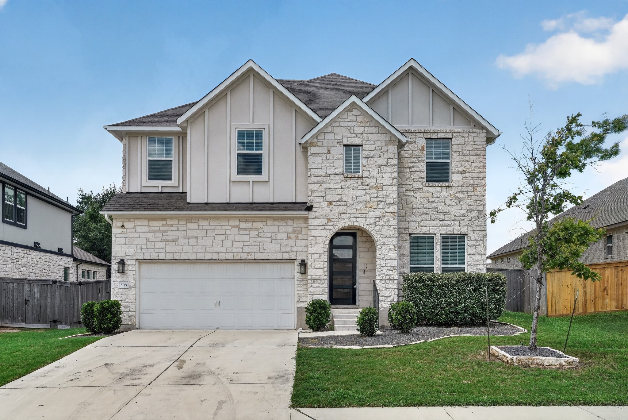 508 Pinnacle View Drive Georgetown, TX 78628 - Photo 1 of 27 A stone and board-and-batten facade offers exceptional curb appeal and an inviting entrance.