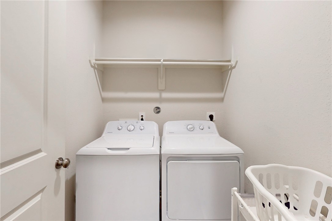 137 Windmill Road Somerville, TX 77879 - Photo 10 of 22 a utility room with dryer and washer