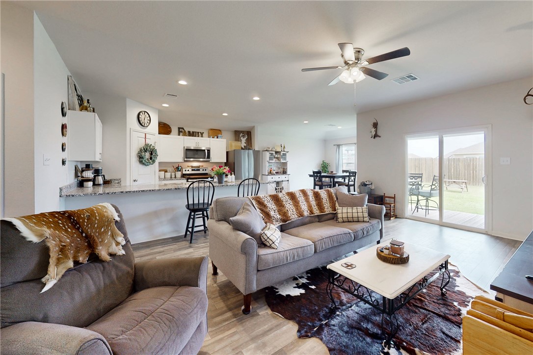 137 Windmill Road Somerville, TX 77879 - Photo 3 of 22 a living room with furniture and view of kitchen