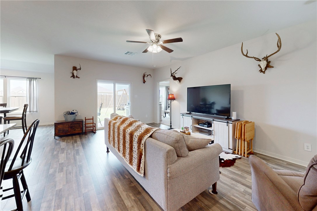 137 Windmill Road Somerville, TX 77879 - Photo 4 of 22 a living room with furniture and a flat screen tv
