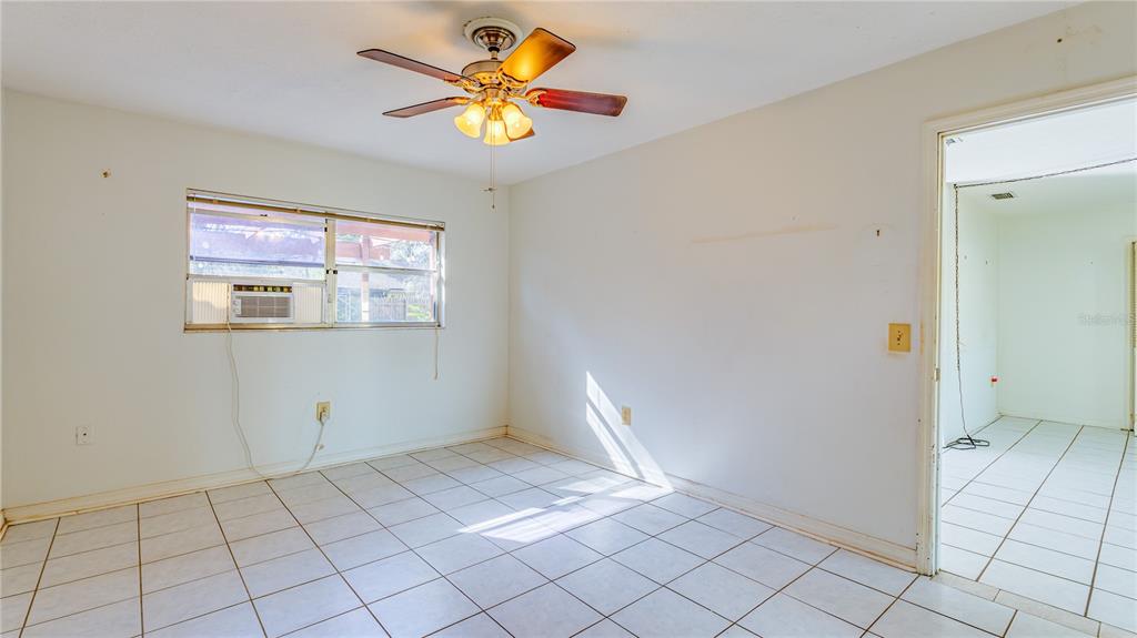 633 Huntington Street Brandon, FL 33511 - Photo 11 of 35 a view of an empty room and window