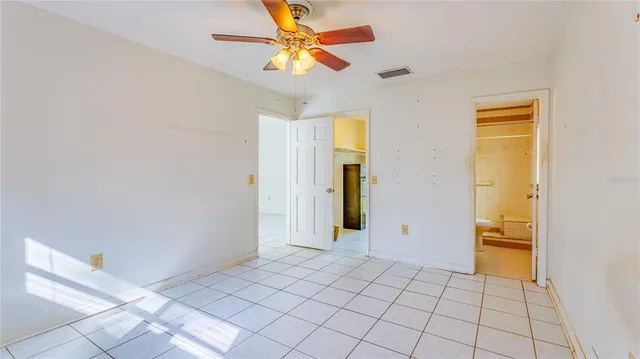 a kitchen with stainless steel appliances granite countertop a sink and a refrigerator